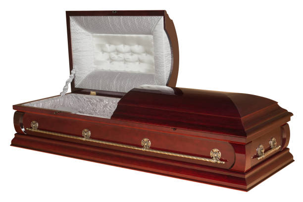 Opened wooden coffin isolated on white background