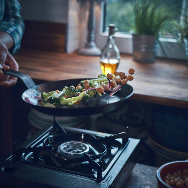 istock Preparing Topping for Vegan Pumpkin Pizza with Vegetables 1045581954