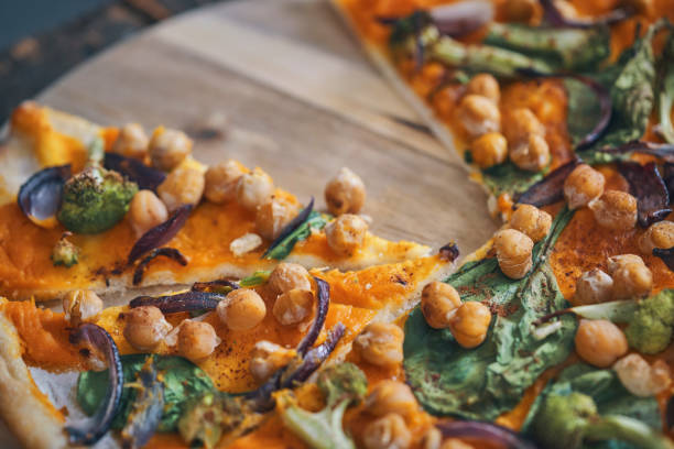 istock Vegan Pumpkin Pizza with Broccoli, Chickpeas and Spinach 1045585200