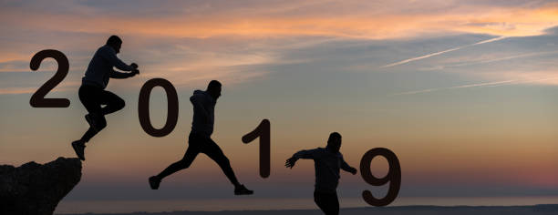 istock A silhouette young man jump  2019 years 1045586626