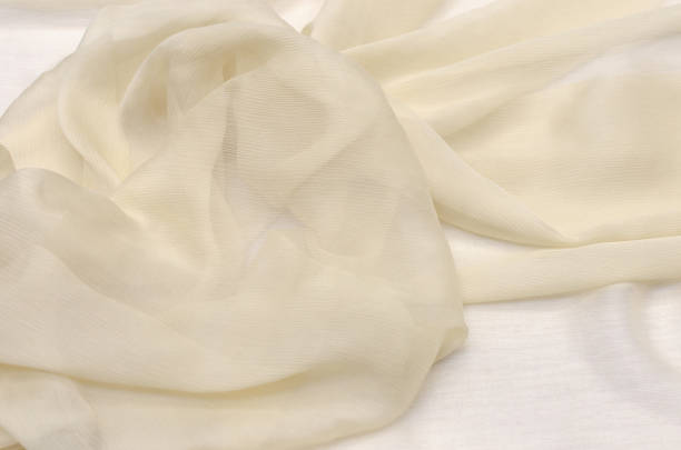 istock Chiffon light beige color, silk fabric 1045587062