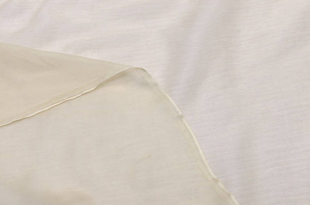 istock Chiffon light beige color, silk fabric 1045587064