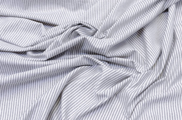 istock Knitwear in gray-and-white stripes 1045596076