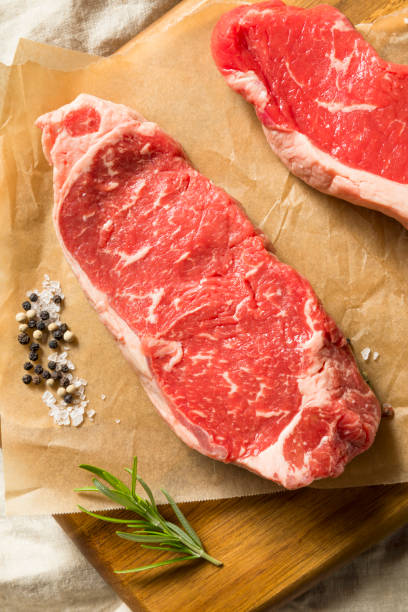 istock Raw Grass Fed NY Strip Steaks 1045596380