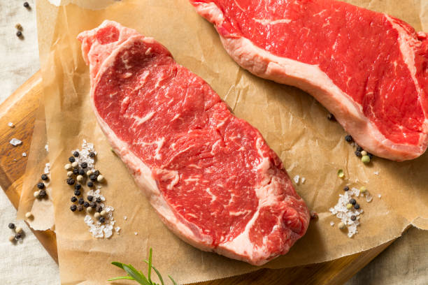 istock Raw Grass Fed NY Strip Steaks 1045598760