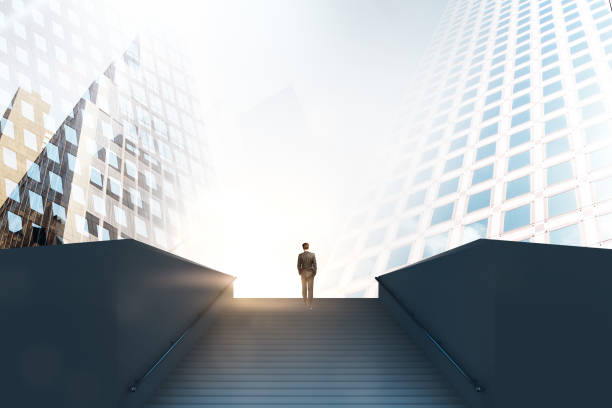 istock stairs too success with businessman 1045602136