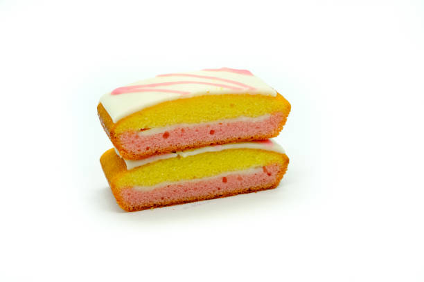 istock Two Slices of Spongecake with Icing 1045602720