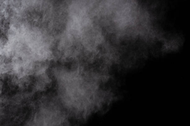 istock Freeze motion of white color powder exploding on black background. 1045609282