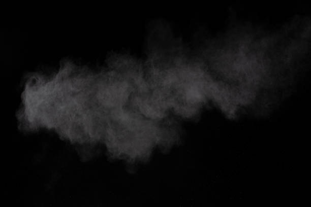istock Freeze motion of white color powder exploding on black background. 1045609366