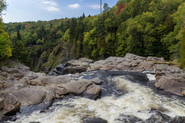 Aerial View of Chute Du Manitou, Cote Nord, Quebec, Canada During Summer.Located 35 km (22 mi.) from Rivière-au-Tonnerre. Manitou Waterfall is a spectacular 35 m (115-ft.) high.