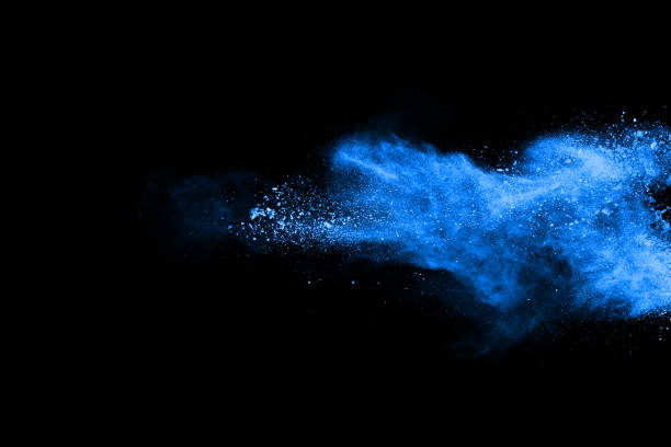 istock Blue powder explosion on black background. Colored cloud. Colorful dust explode. Paint Holi. 1045609542