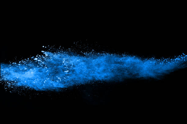 istock Blue powder explosion on black background. Colored cloud. Colorful dust explode. Paint Holi. 1045609558