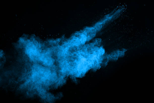 istock Blue powder explosion on black background. Colored cloud. Colorful dust explode. Paint Holi. 1045609564