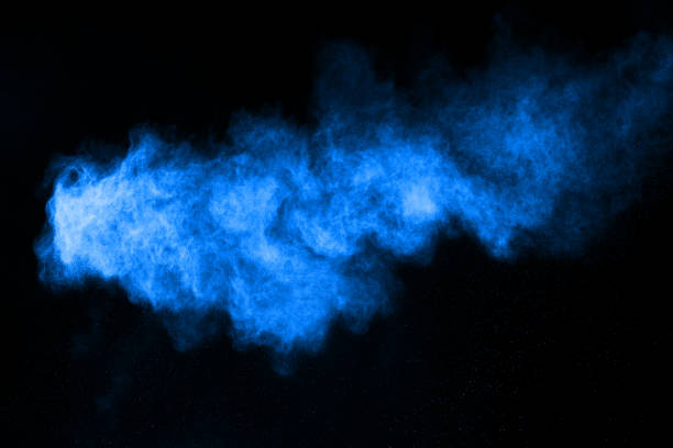 istock Blue powder explosion on black background. Colored cloud. Colorful dust explode. Paint Holi. 1045609624