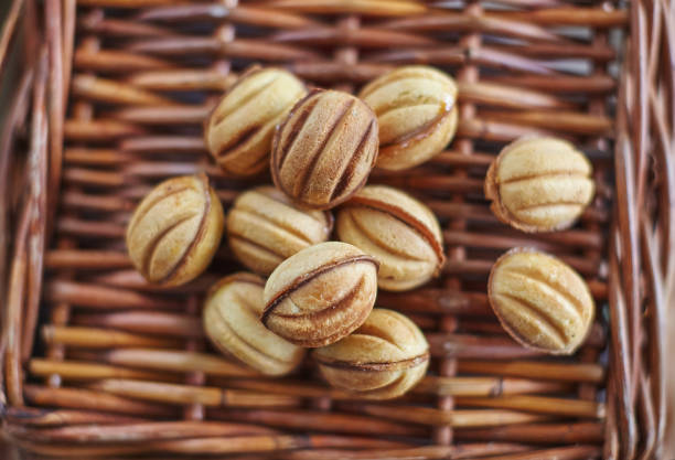 Traditional russian festive cookies in nut shape with caramelized milk inside