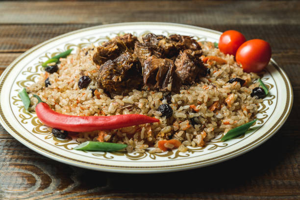 istock Uzbek national dish pilaf with meat 1045622672