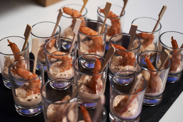 istock Shrimp cocktail with sauce on black stone tray table 1045638168