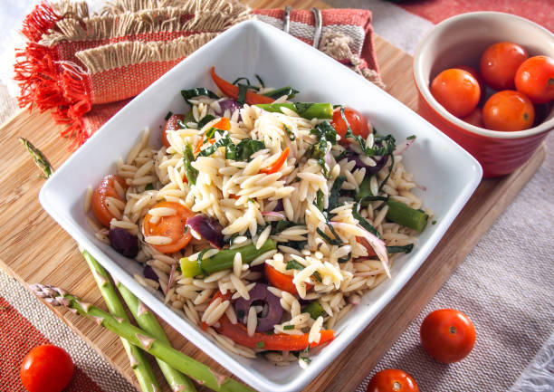 istock Healthy orzo pasta salad with vegetables 1045641750