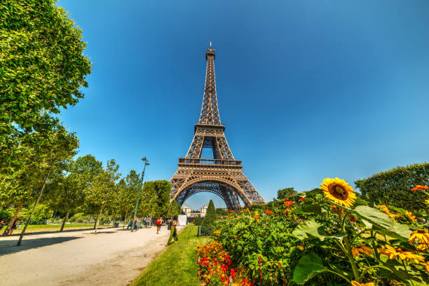 istock Tourists by world famous Eiffel tower in Paris 1045644196