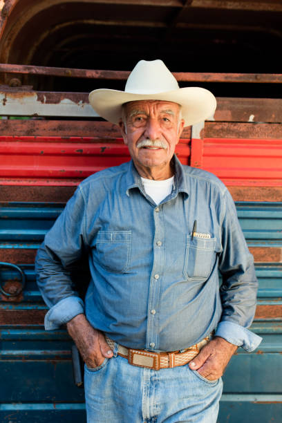 istock Lovely senior man standing with hands in pockets 1045664506