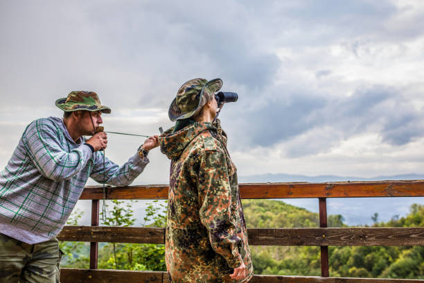 istock Camouflage scouts on the hill 1045669162