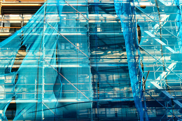 Damaged building surrounded by scaffolding Damaged building surrounded by scaffolding following the Christchurch earthquake in 2011 christchurch earthquake stock pictures, royalty-free photos & images