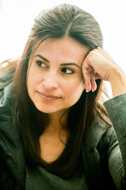 istock Smiling mature woman looking away 1045681522