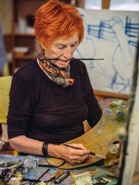 istock Senior woman artist at work 1045681864