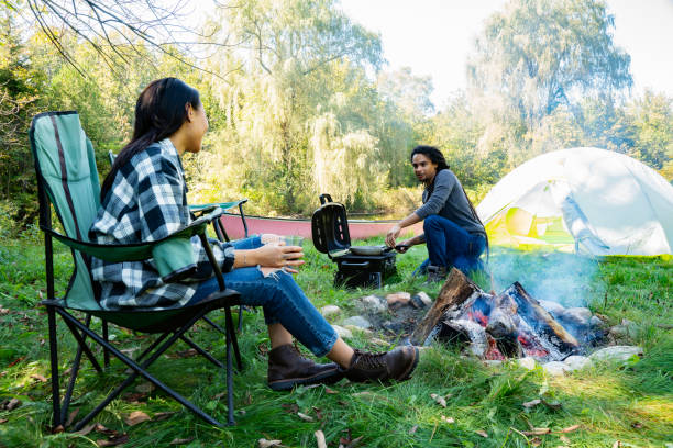 istock A millennial couple enjoying a camping trip 1045686018