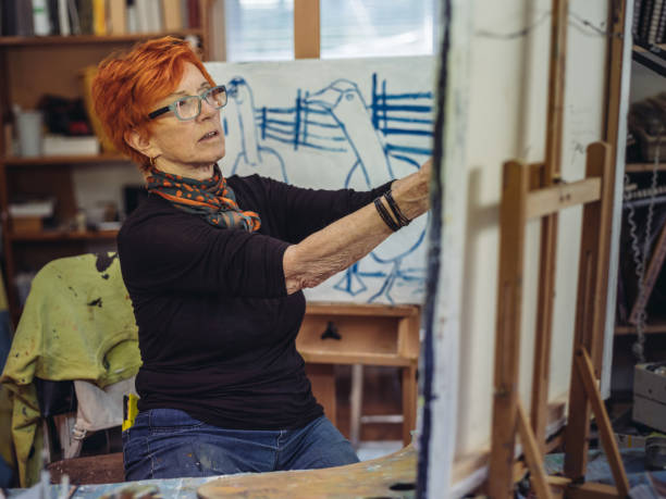 istock Senior woman artist at work 1045686246