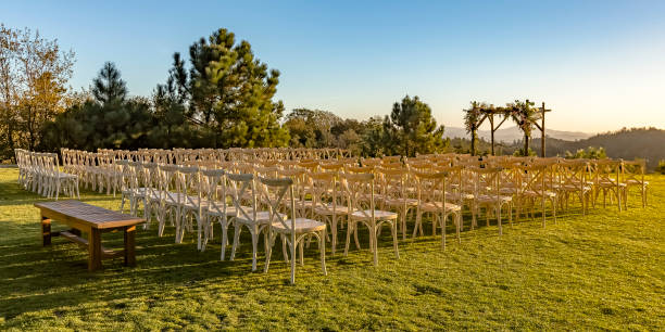 istock Chairs and Chuppah on a lawn with stunning view 1045693410