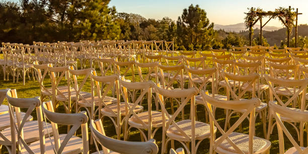 istock Rows and columns of chairs facing a Chuppah 1045693482