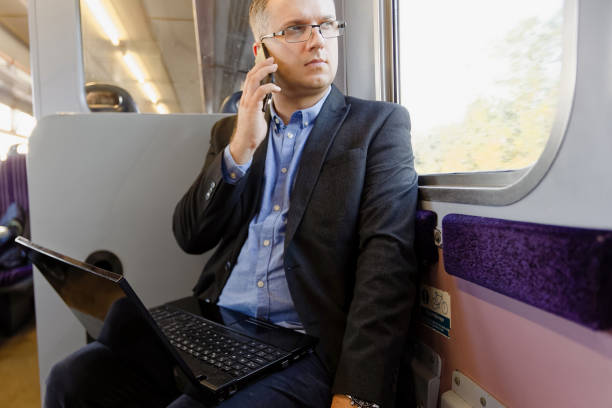istock man seating in rail station 1045696932