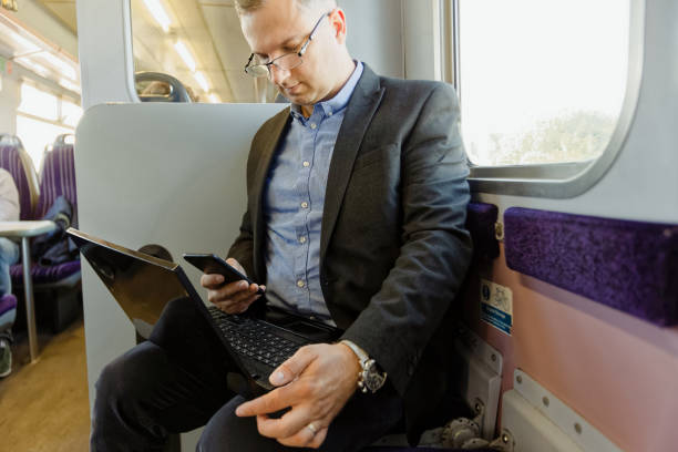 istock man seating in rail station 1045697030