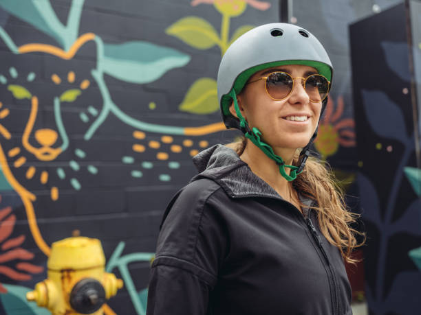 istock Young woman on cruiser bicycle 1045703066