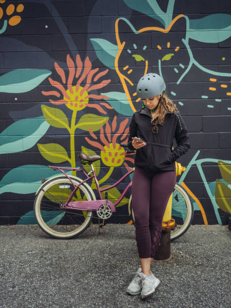 istock Young woman on cruiser bicycle 1045705184