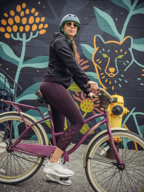 istock Young woman on cruiser bicycle 1045705334