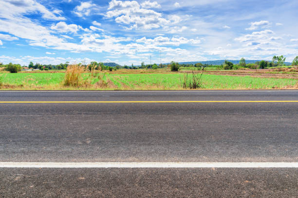 istock Asphalt road side view and landscape countryside. 1045705548