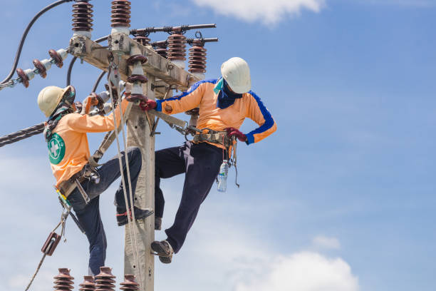 Asian men engineering working on high voltage stock photo