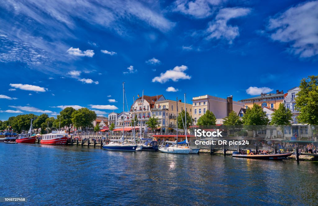 Warnemuende, Rostock, Germany A view of the canal that runs through the center of this tourist town lined with restaurants, stores and parks Warnemünde Stock Photo