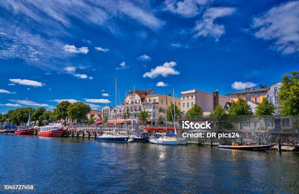 Warnemuende Rostock Germany A View Of The Canal That Runs Through The Center Of This Tourist Town Lined With Restaurants Stores And Parks Stock Photo - Download Image Now