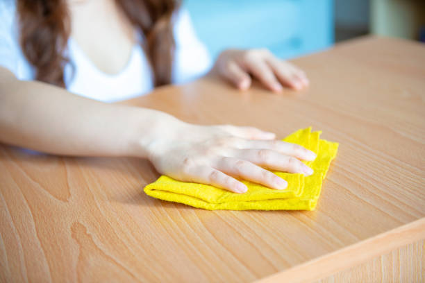 istock Woman cleaning the table 1045732424