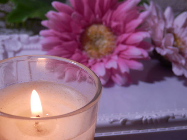 istock Rose and Margaret, candle and photo frame 1045735410