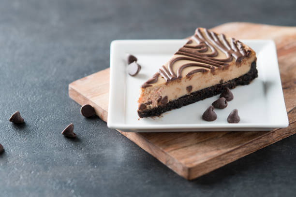 istock Chocolate peanut butter swirl cheesecake dessert 1045742254