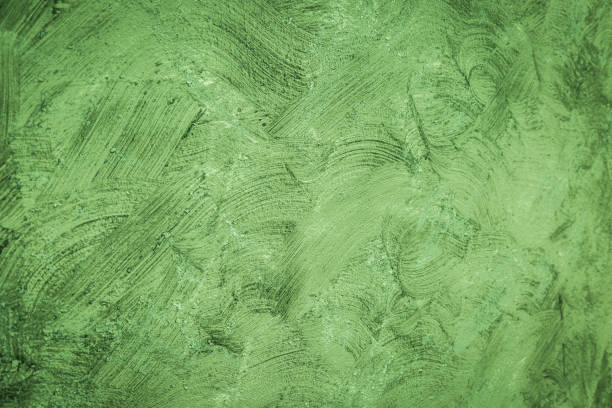 istock Green and Gray Brushed white concrete wall texture 1045789230