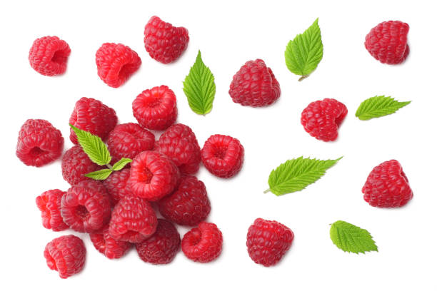 istock ripe raspberries with green leaf isolated on white background. top view 1045796242