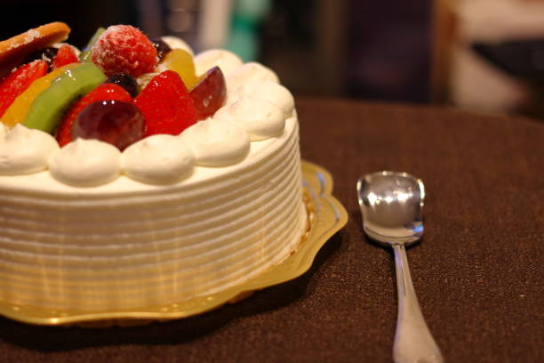 istock whole cake with fruits 1045798530