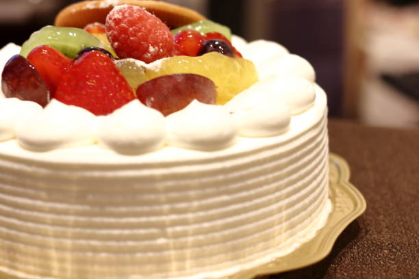 istock whole cake with fruits 1045798608