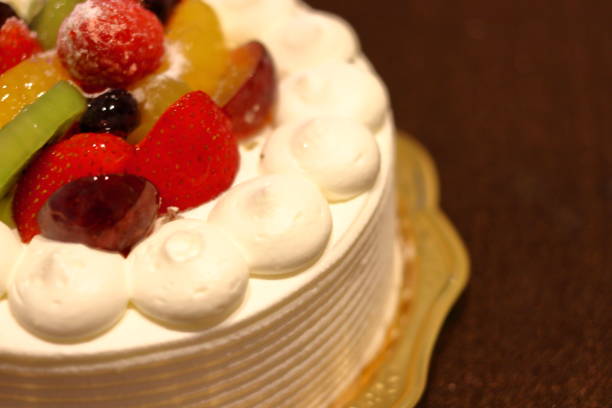 istock whole cake with fruits 1045798642