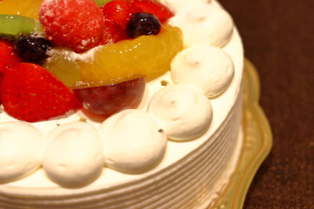 istock whole cake with fruits 1045798698